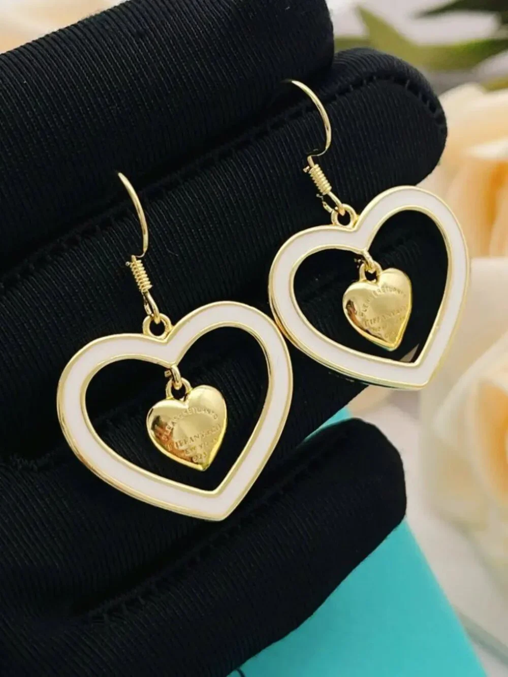 Tiffany & Co. Gold Tassel White Heart Earrings